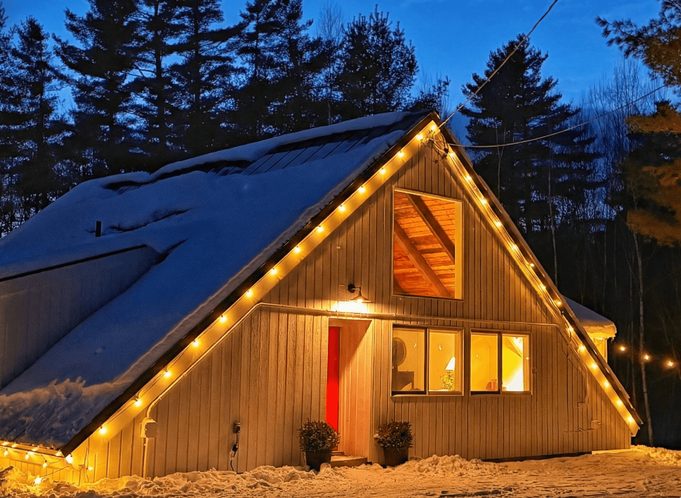 Stratton Ski Haus illuminated at night