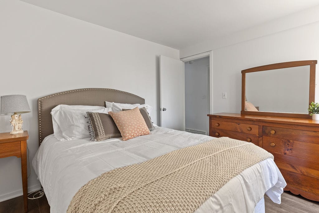 Queen bedroom with soft natural light